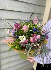 Beautiful country garden style hand tied bouquet, presented in a gift box in water.