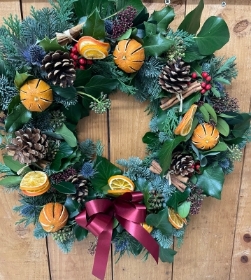 Mixed foliage Christmas door wreath.